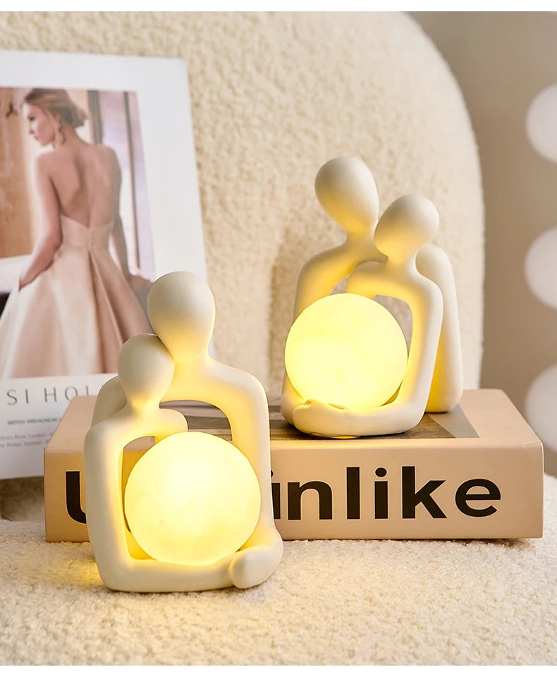 Enhance your living room or bedroom with the Couple Statue from SpecTecHome & Decor. This small ceramic sculpture offers a perfect blend of minimal decor, midcentury modern style, and bohemian charm. Ideal as a tabletop decoration, its sleek design complements white decor, grey decor, and any modern aesthetic