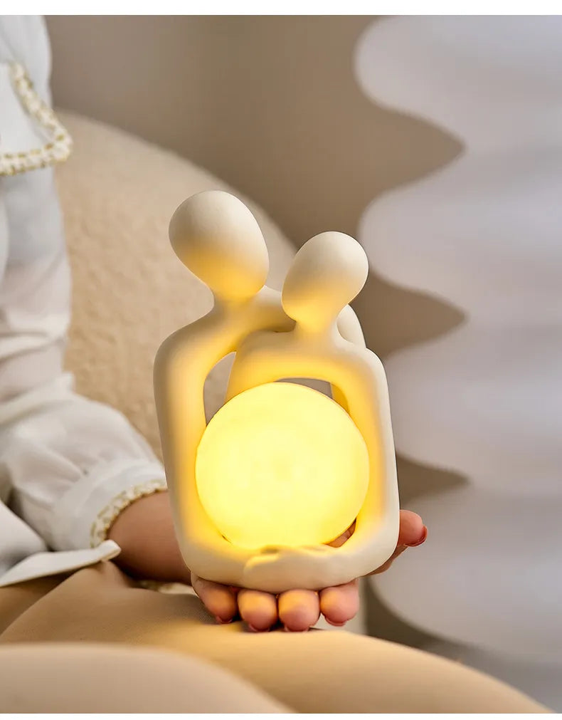 Enhance your living room or bedroom with the Couple Statue from SpecTecHome & Decor. This small ceramic sculpture offers a perfect blend of minimal decor, midcentury modern style, and bohemian charm. Ideal as a tabletop decoration, its sleek design complements white decor, grey decor, and any modern aesthetic